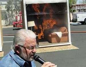 Ron Hazelton narrates burn demonstration for fire sprinklers